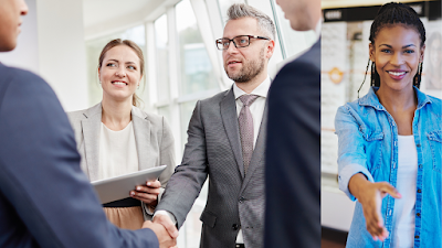 A photo of people greeting each other in a meeting