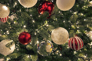 Photo of Christmas decorations on a tree.