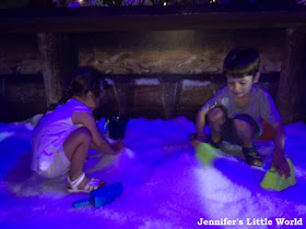 Playing in the snow play area at Disney World Florida