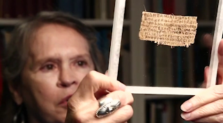 Karen King with the papyrus fragment