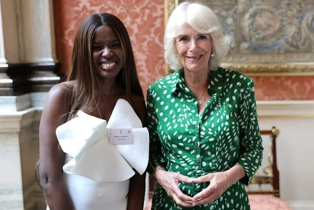 Queen Camilla wore a green Audrey drapery dota dress by Samantha Sung. Colonel Ruth Weir. Bee Garden Party at Marlborough House
