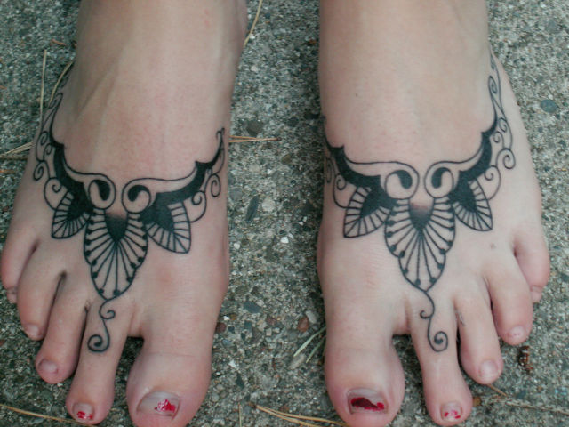 arowana tattoo. Crazy Foot Tattoos