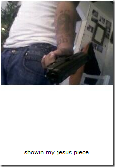 Holdin' a gun lookin' all tyopes of illegal then he had the nerve to have Jesus tatted on his gun arm smh