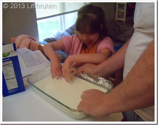 Supergirl and Daddy explore a non-newtonian solid.