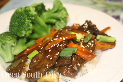 A Chinese-American dish of tender beef, tossed in a rich and robust sauce, with stir fried carrots, sweet bell peppers and green onion. Serve over steamed rice or cooked Asian noodles with a side of steamed broccoli.