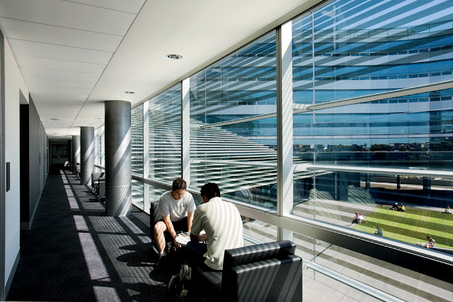 Two students sitting by the window 