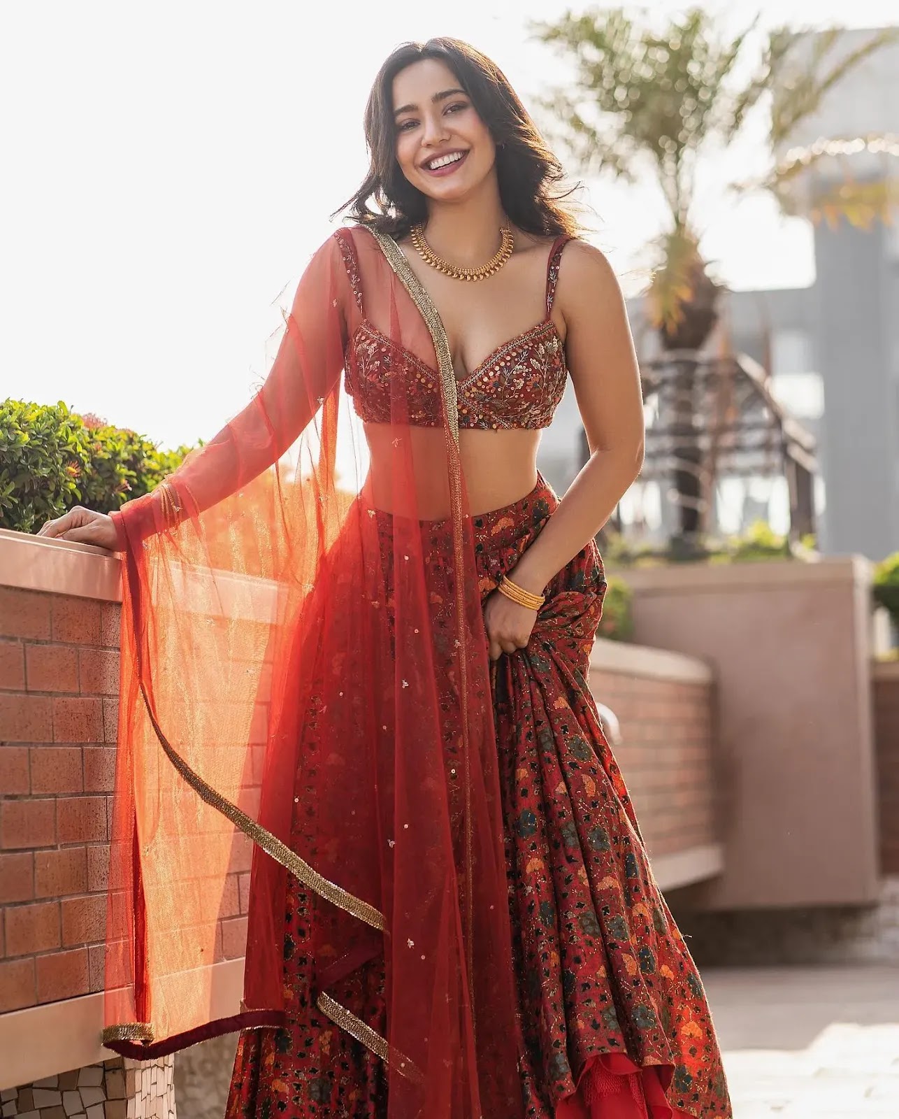 Neha Sharma cleavage red bralette