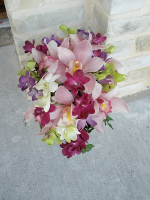 All orchid tear drop bridal bouquet Posted by Kaywin Kubesch AIFD 