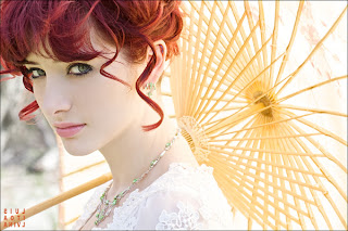 Sexy-eyes-susan-coffey-picture-with umbrella-in-red-hair-looking-hot