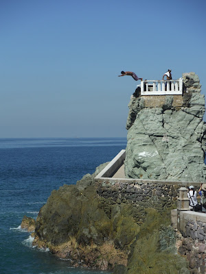 A cliff diver jumping in Mazatlan, Mexico