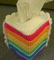 http://www.ravelry.com/patterns/library/rainbow-cake-tissue-cozy