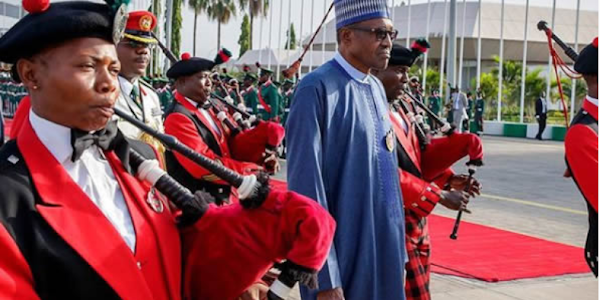 Now, men wear skirts to welcome Buhari