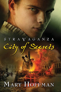 A green-eyed guy's face is above a pillar with three people tied to it, burning in the middle of a city square.
