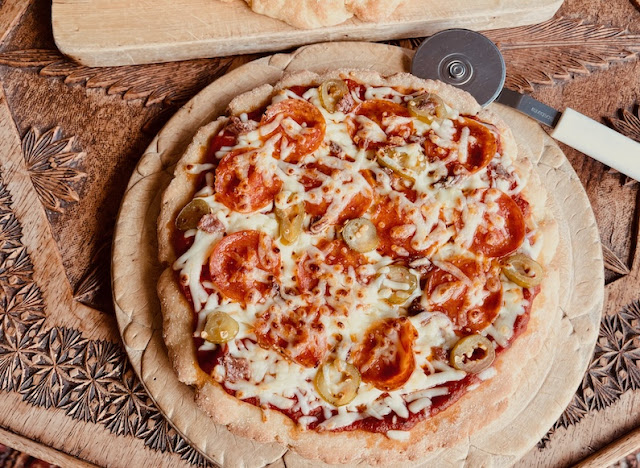 Food Lust People Love: Long proofing and the addition of baking powder ensure that this parbaked gluten free pizza crust is chewy, crunchy and able to support all the toppings you love.