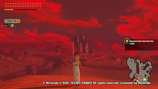 Zelda in her ceremonial dress standing in front of Gerudo Town during the Blood Moon