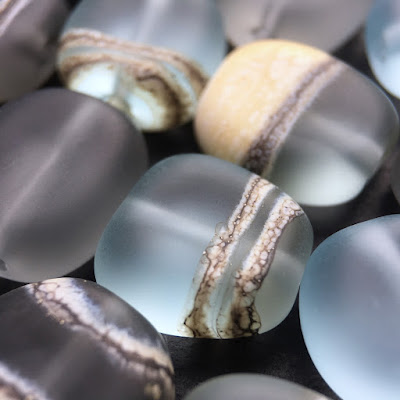 Tumble-etched lampwork glass pebble beads by Laura Sparling