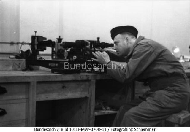 Soldier testing a telescope in France, 14 March 1942 worldwartwo.filminspector.com