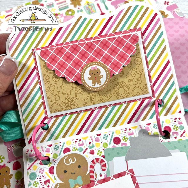 Christmas scrapbook mini album page with envelope, candy, stripes, and gingerbread cookies