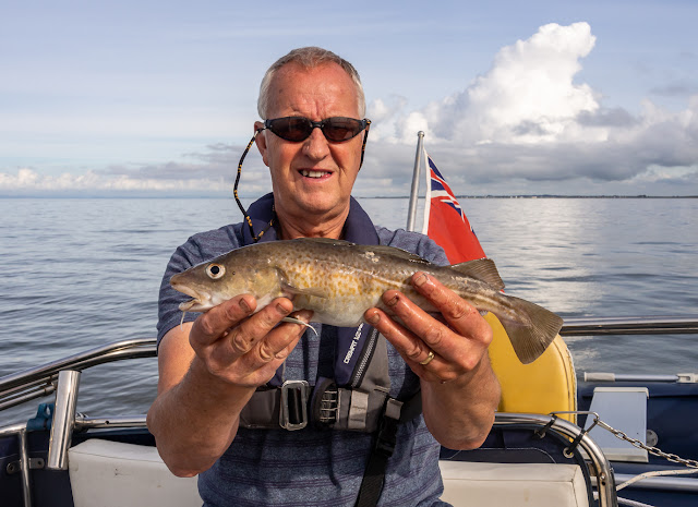 Photo of Phil with one of the larger codling he caught on this trip