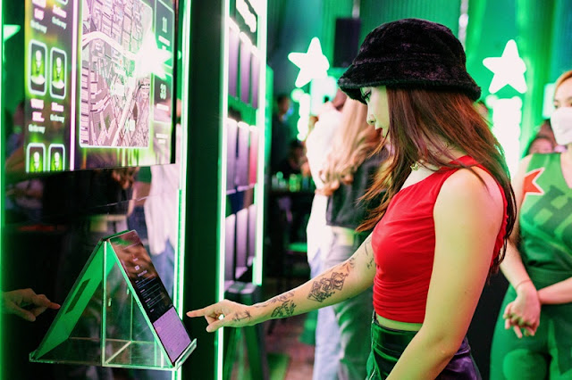 A guest inviting a friend to the outlet through The Ghosted Bar Command Centre