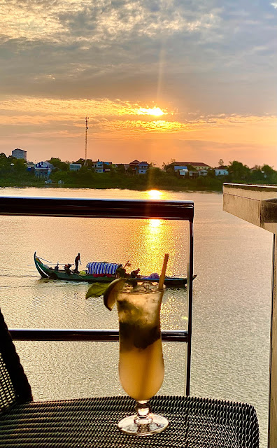 Cocktail at sunset aboard Emerald Cruises Emerald Harmony on the Mekong