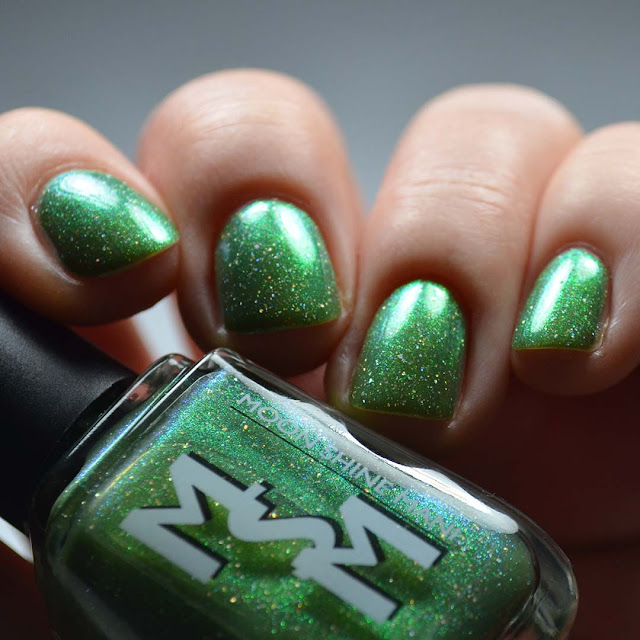 green shimmer nail polish swatch