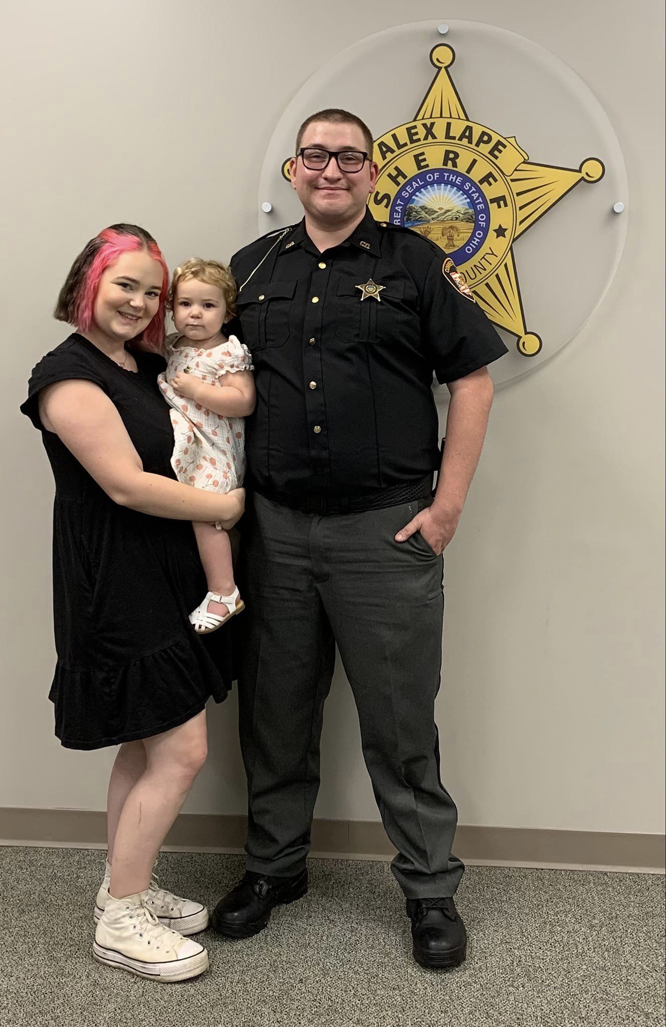 sheriff, woman and baby