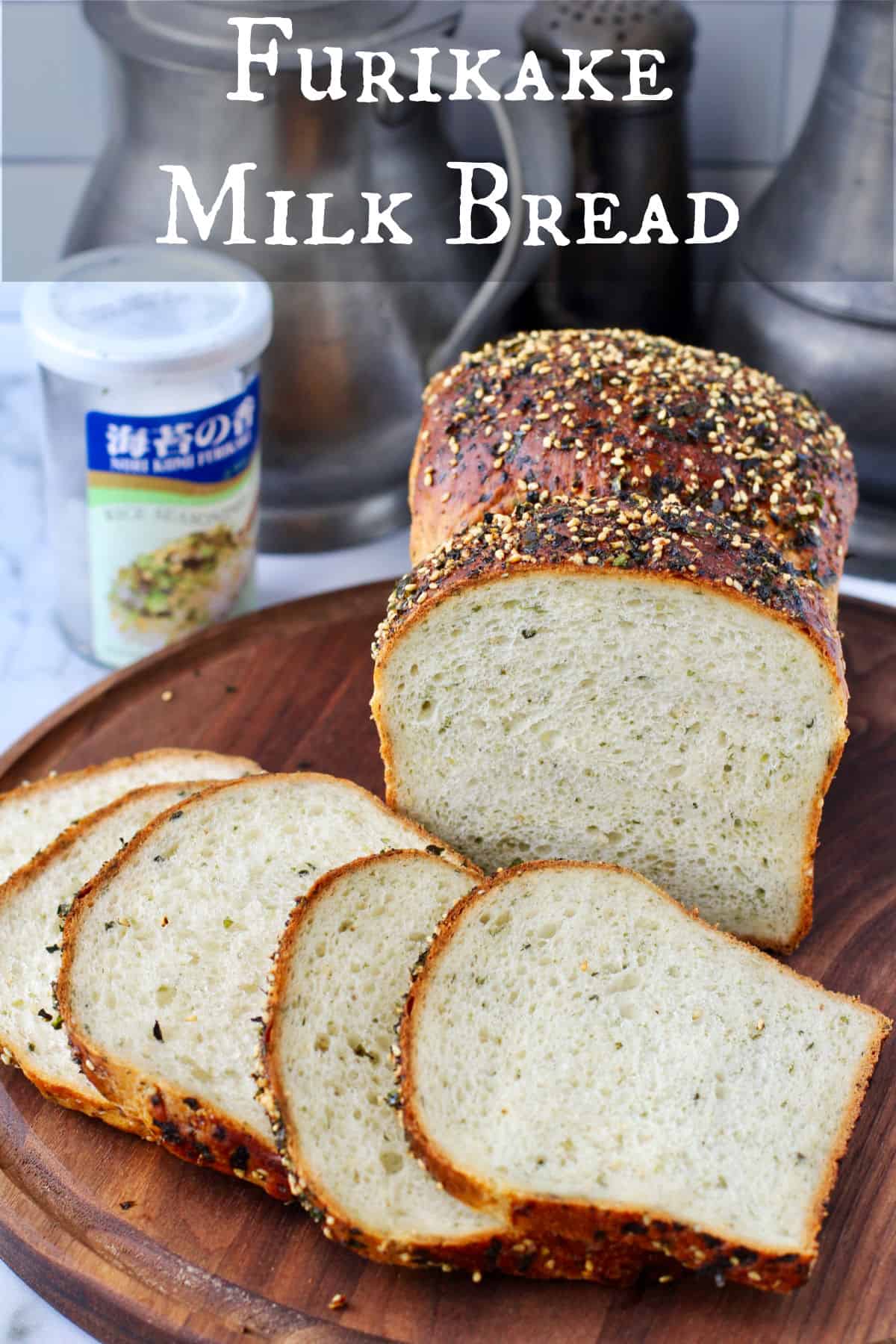 Japanese Milk Bread with Can of Furikake on a cutting board.