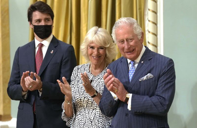Prince Charles, Prime Minister Justin Trudeau, and Mary Simon, Governor General of Canada. the Duchess of Cornwall wore a blue dress