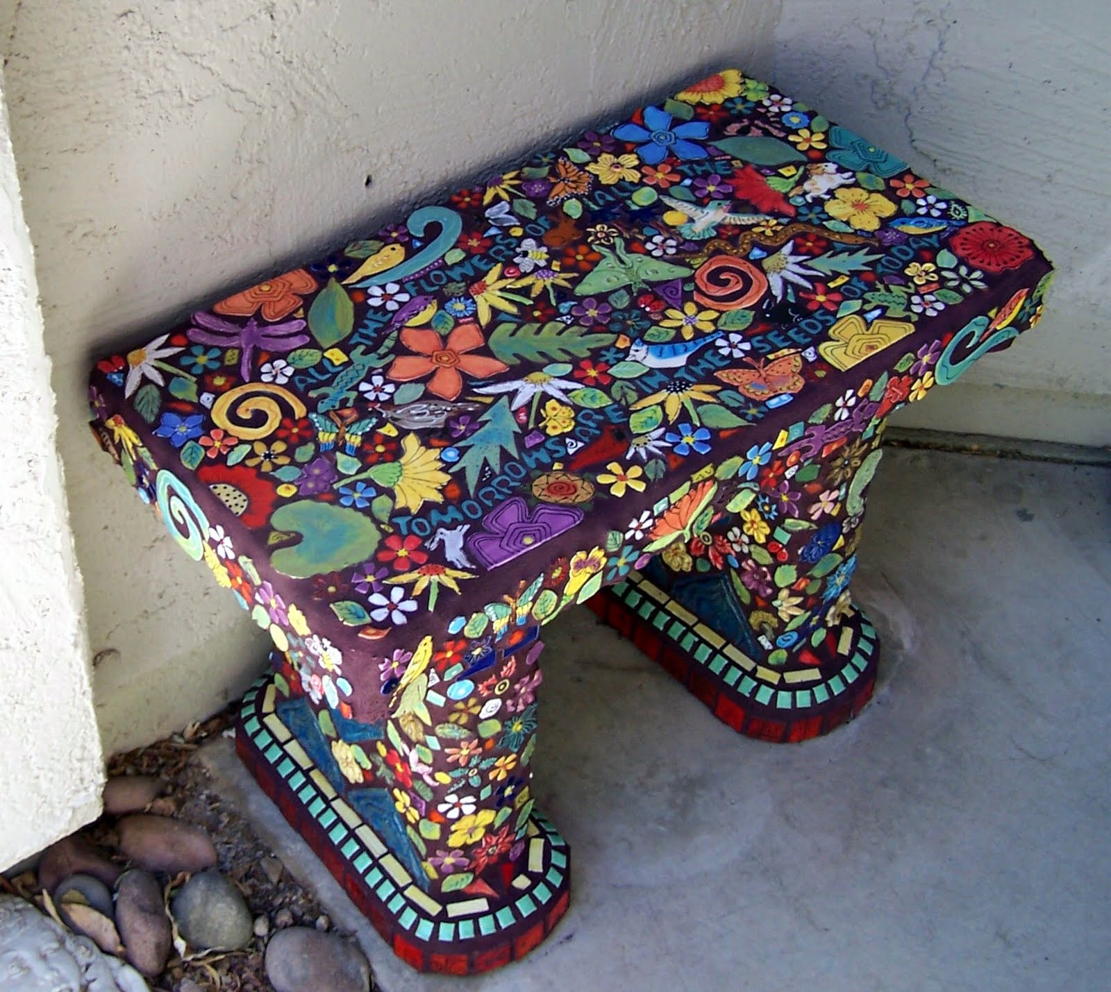 handmade tile studio: bench covered with handmade tiles
