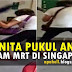 Video : Wanita Pukul Anak Dengan Payung Dalam MRT di Singapore