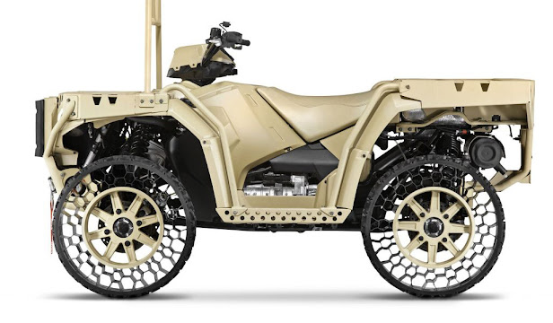 Polaris ATV con ruedas sin aire