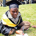 Armless young man who writes with his feet graduates from the university