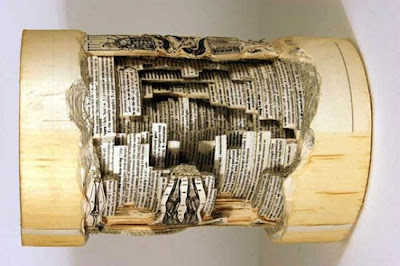 Beautiful things can be made from books with a knife www.coolpicturegallery.net