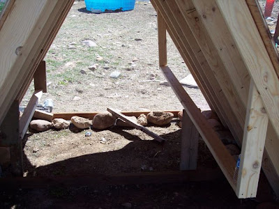 chicken coop roost. an A-frame chicken coop