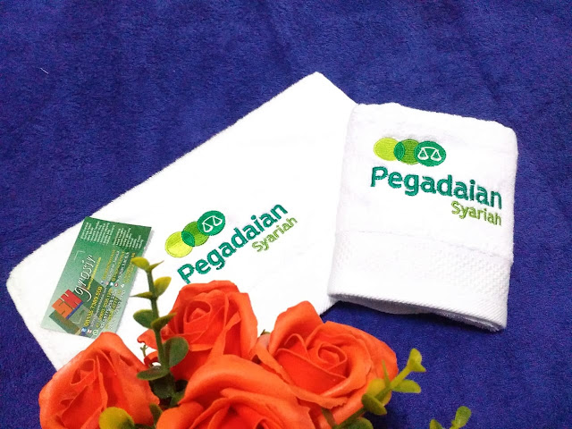 Souvenir promosi pegadaian dengan handuk bordir