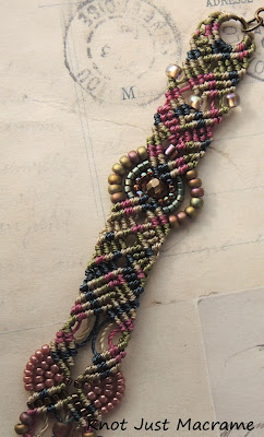 Close up of colorful micro macrame knotting.