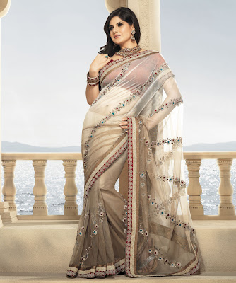 BRAND: Brijraj CATEGORY: Saree with Unstitched Blouse COLOUR: Saree: Cream and Grey Blouse: Rust  MATERIAL: Saree: Net Blouse: Poly Dupion