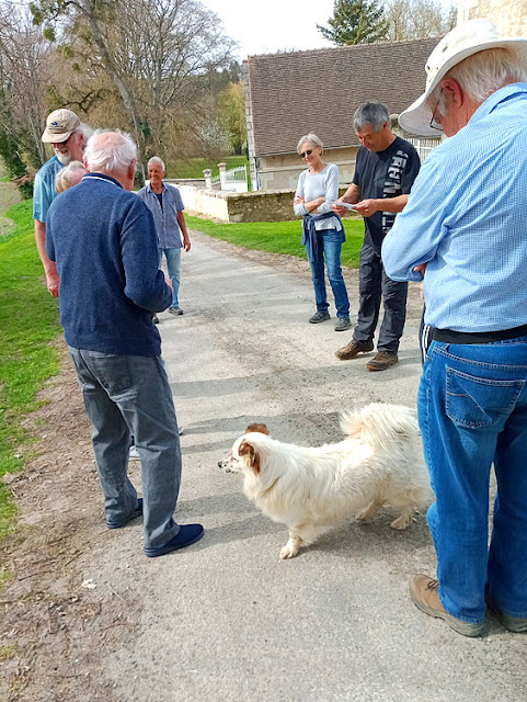 Walkers chatting to a resident in a hamlet, Indre et Loire, France. Photo by Loire Valley Time Travel.