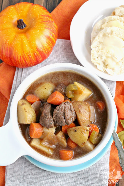 Stay warm & cozy this fall with this hearty & flavorful Slow Cooker Pumpkin Ale Beef Stew.