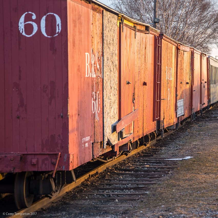 Portland, Maine USA January 2017 photo by Corey Templeton of Maine Narrow Gauge Railroad boxcars sitting for the winter along the Eastern Waterfront.