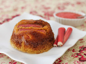 Food Lust People Love: This fresh rhubarb steamed sponge pudding is a light springtime recipe, highlighting the gorgeous pink tart rhubarb that is available now. This sticky dessert takes a while to cook but it's mostly hands off time. Wait to you bite into its soft sponge with tart topping! Totally worth the effort. The glossy pink rhubarb on top of this steamed pudding is a welcome bit of color on a dreary cold day.