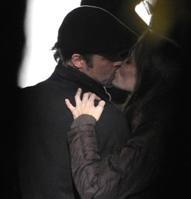 Angelina Jolie kissing Brad Pitt and working on her movie in Budapest