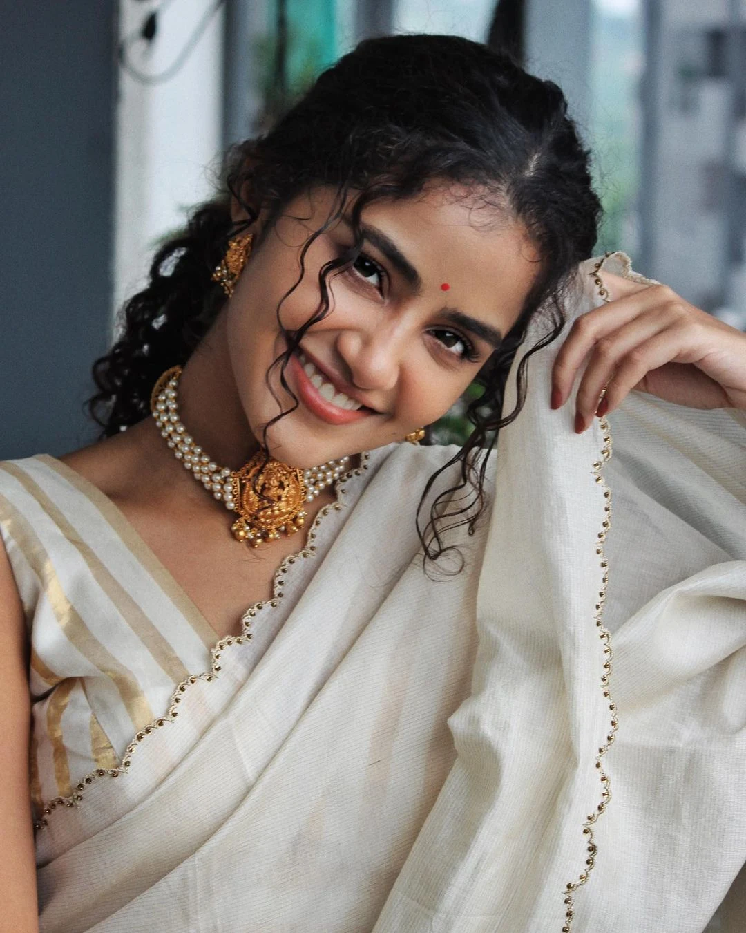 Anupama Parameswaran graceful looking in white Saree