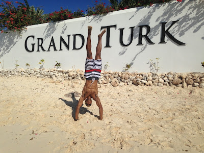 The most common pose I do - a handstand (Grand Turk)