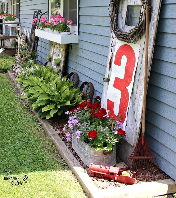 Photo of side yard junk garden decor