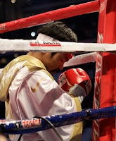 Manny Pacquiao prays