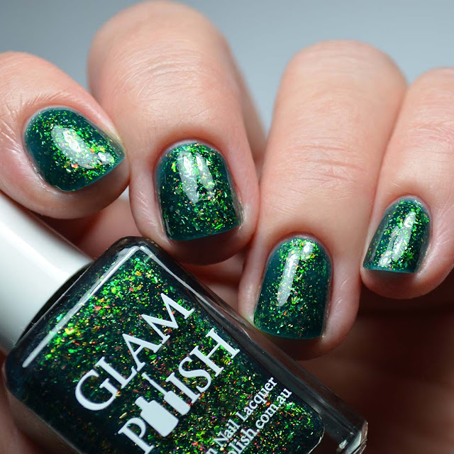 green flakie nail polish swatch different lighting