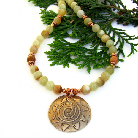 spiral sun bronze pendant and striped honey onyx gemstone necklace