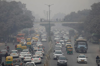 Vehicles drive through smog in New Delhi, India, on Dec 5, 2017. (Photo Credit: Reuters) Click to Enlarge.